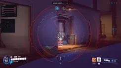 UDP in Overwatch through a sniper scope on Defend Objective A: an enemy skeleton with 100% ultimate charge, the ultimates panel and radar on the left