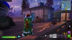 Ghost Full Fortnite loot ESP: weapon names such as Boneratter SMG and Tactical Pistol, ammo types with distance in meters, distant players with platform tag, radar on the left