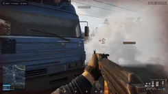 Ghost in Wardogs through smoke next to a truck: ESP boxes, names and distance on enemies, ADS tags on two aiming players, a Kodiak pickup at 169 m